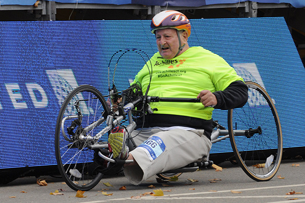 Dick Traum competing in the TCS New York  City Marathon in a handcycle